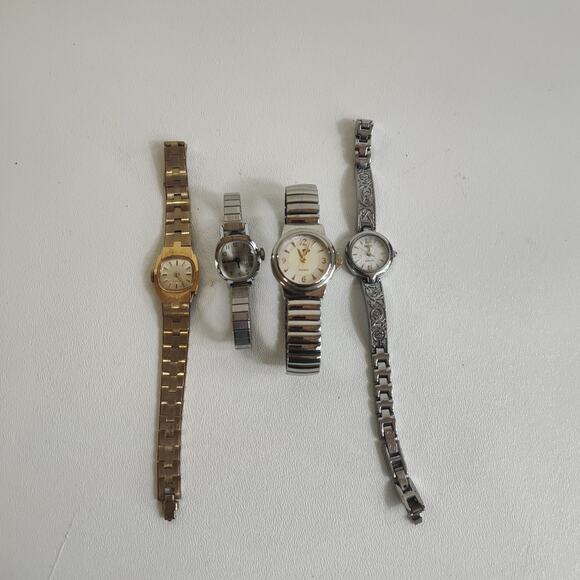 Lot Of 4 Womens Wristwatches 2 Timex 1 Relic Folio 1 LTD All Need Batteries‎ - Picture 1 of 6